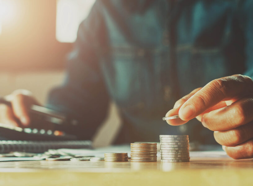 Saving money woman hand putting coin stack concept business finance Saving money woman hand putting coin stack concept business finance