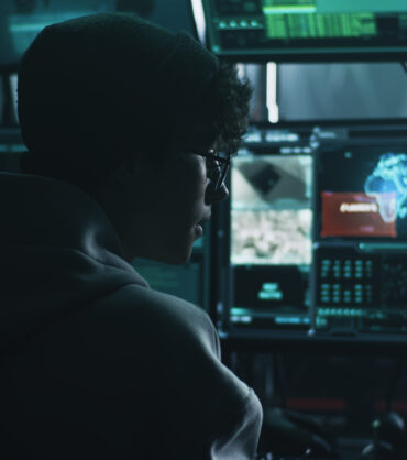 Young man hacking system