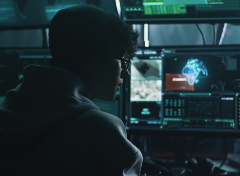 Young man hacking syste