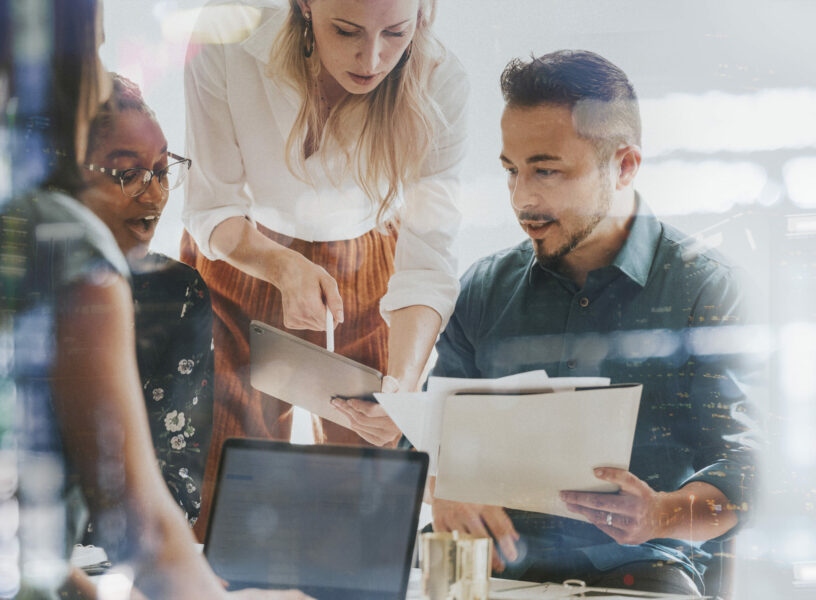 Business people working with a digital tablet in a meeting